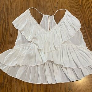 White Free People V neck sleeveless blouse with beautiful ruffles